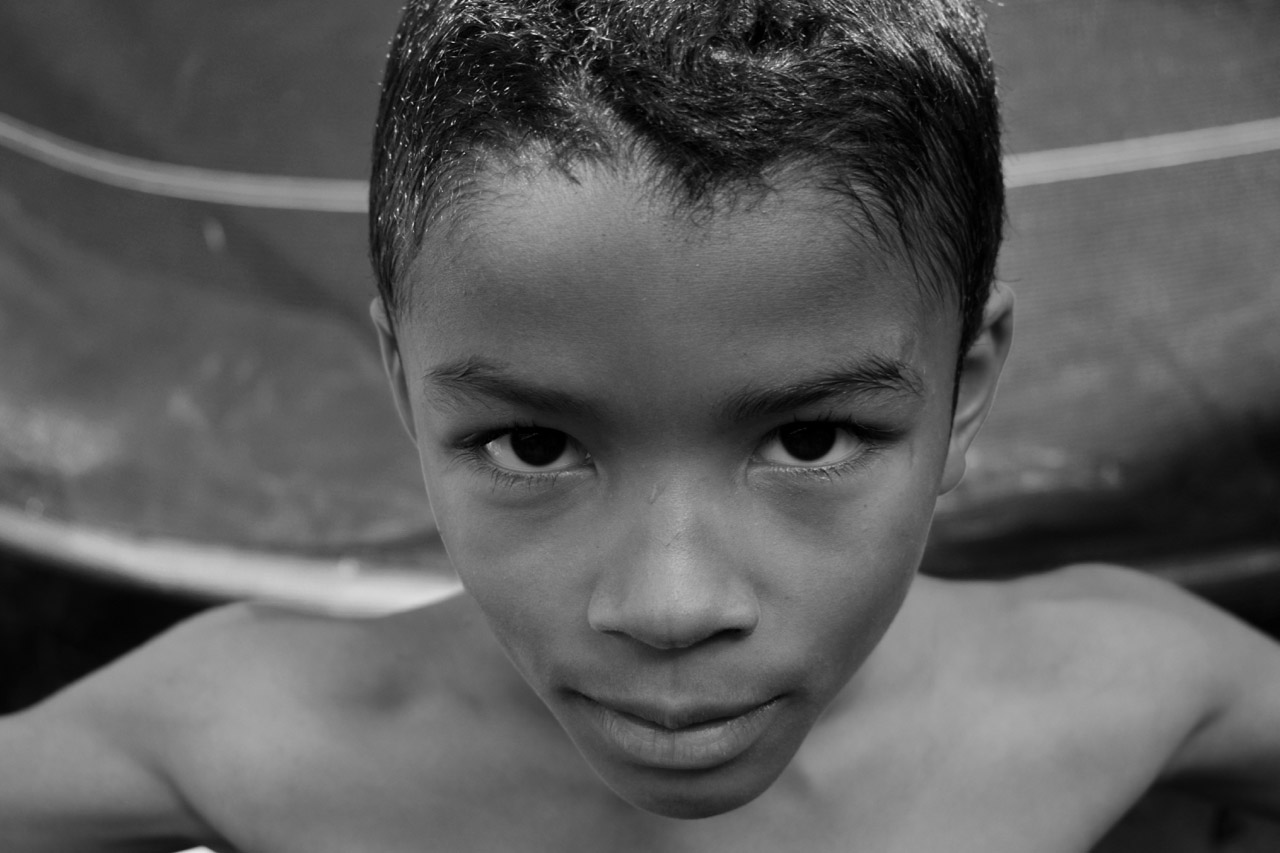 Boy smirking to camera